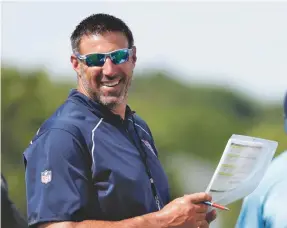  ?? MARK HUMPHREY/AP ?? Titans coach Mike Vrabel, above, said of meeting James Shaw Jr., “You just really see how calm and controlled he was in the situation.”
