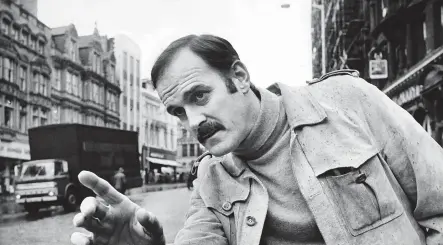  ?? ?? ■ Basil Fawlty, in the shape of John Cleese, was in Newcastle to promote the book of scripts written by himself and his wife Connie Booth for the hit TV series Fawlty Towers. John is pictured in Newcastle’s Bigg Market, November 21, 1977