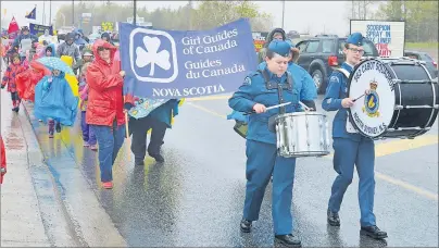  ?? JAKOB POSTLEWAIT­E PHOTOS/CAPE BRETON POST ?? Girl guides from across Cape Breton paraded through North Sydney for the Dream and Discover the Magic of Guiding event at the Cape Breton County Exhibition grounds on Saturday.