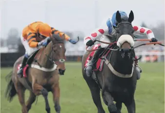  ??  ?? Clan Des Obeaux and Harry Cobden pull away from Thistlecra­ck to win the King George VI Chase.