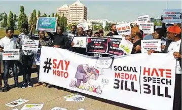  ??  ?? Nigerians protesting against the proposed social media and hate speech bill