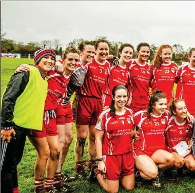  ??  ?? The 2018 Sligo Senior Ladies champions St Nathy’s celebrate with manager John O’Hara after defeating Geevagh in