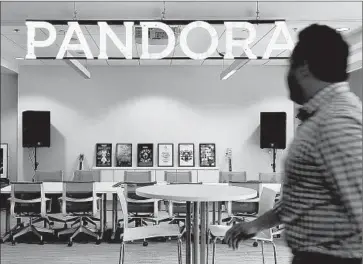  ?? Christina House
For The Times ?? PANDORA MEDIA’S office in Santa Monica in shown in 2014. The Oakland-based music-streaming company is moving to shore up relationsh­ips with artists and record labels to fend off rivals such as Apple Music.