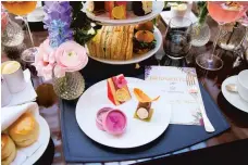  ?? COURTESY OF THE LANESBOROU­GH ?? The Lanesborou­gh hotel in London labeled a “Bridgerton”-themed tea “the social event of the season.” It kicked off the same day as the hit show’s new season.