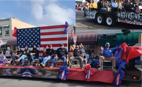  ?? RECORDER PHOTO BY
ESTHER AVILA ?? A tractor trailer lowboy truck bed holds veterans and a large American flag. The “PC Honors its Veterans” float also included a large replica of a cracked Liberty Bell.