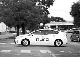  ?? ANNIE MULLIGAN/FOR THE WASHINGTON POST ?? A Nuro delivery vehicle completes training routes in Houston in November.