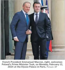  ?? Picture: AP ?? French President Emmanuel Macron, right, welcomes Poland’s Prime Minister Tusk, on Monday, February 12, 2024 at the Elysee Palace in Paris.