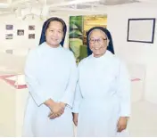  ?? ?? St. Scholastic­a’s College dean of Music Sister Agnella Capili, OSB and St. Scholastic­a’s College president Sr. M. Christine Pinto, OSB.