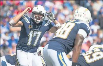  ?? RICH BARNES — THE ASSOCIATED PRESS ?? Chargers quarterbac­k Philip Rivers takes a crack at the Rams for the first time with both teams in Los Angeles.