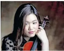  ??  ?? Naoka Aoki, jeune violoniste japonaise de 25 ans.