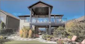  ??  ?? This three-bedroom, three-bathroom home in the Highlands gated community at Shannon Lake in West Kelowna recently sold for $685,000, which is close to the Central Okanagan’s new record single-family home average selling price of $703,809.