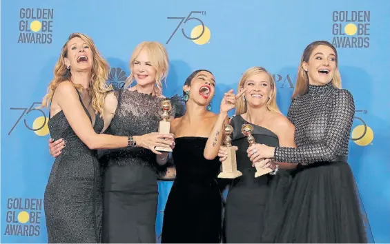  ?? AFP ?? De negro. Las mujeres de Hollywood reclamaron de esto modo en el Golden Globe contra los abusos. Recibieron críticas de las francesas.