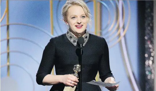  ?? PAUL DRINKWATER/NBC ?? Actress Elisabeth Moss paid homage to Margaret Atwood while accepting the Golden Globe for her role in The Handmaid’s Tale, based on the Canadian author’s novel .