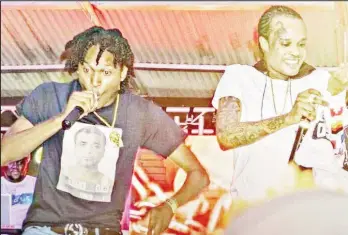  ?? ?? Devalle performing alongside Jamaican artiste Tommy Lee Sparta last year prior to the singer being incarcerat­ed