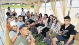  ?? HT FILE ?? The 14member group is seen in this August 8 photograph at the Sukhna Lake in Chandigarh. Jason Dosanjh (extreme right) visited his native Dosanjh Kalan village in Jalandhar district for the first time during the trip.