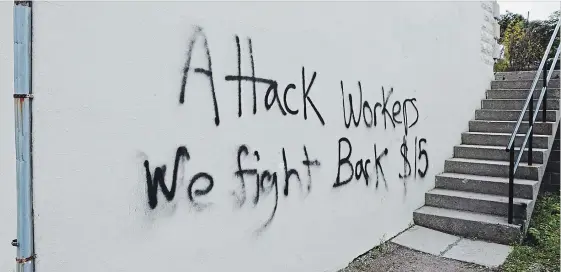  ?? MIKE LACEY/METROLAND ?? The constituen­cy office of Minister of Labour Laurie Scott was vandalized overnight after the Tories introduced a new labour bill Tuesday.