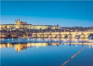  ?? ANDREAS MEICHSNER THE NEW YORK TIMES ?? Prague, the capital of the Czech Republic, Ivana Trump’s country of birth. An early morning jog over the Charles Bridge revealed that it is a kind of outdoor museum of Baroque bronze sculpture.