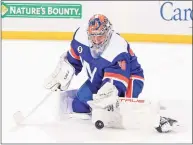  ?? Bruce Bennett / Getty Images ?? The Islanders’ Semyon Varlamov makes the first-period save against the Dallas Stars on Saturday.