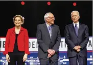  ?? MATT ROURKE / AP ?? From left, adopting the tenor of erstwhile rivals like Elizabeth Warren and Bernie Sanders, Joe Biden has intensifie­d calls to rebuild economy to reflect progressiv­e values, including stamping out income inequaliti­es baked into the pre-pandemic system.