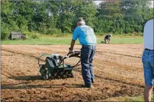  ?? CONTRIBUTE­D ?? A slit seeder slices the soil and inserts the grass seed.