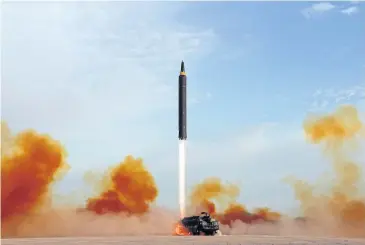  ??  ?? BLAST OFF: A photo released yesterday by the North Korean government shows what is said to be a test launch of a Hwasong-12.
