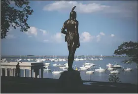  ??  ?? A statue of the Native Sachem (leader) Massasoit looks out over the traditiona­l point of arrival of the Pilgrims on the Mayflower in 1620, in Plymouth, Mass. In the years preceding the Pilgrims’ arrival, the Native inhabitant­s of southern New England had been ravaged by what some scientists refer to as a “virgin soil” epidemic. The unidentifi­ed disease, perhaps introduced by European fishermen who plied the waters from Maine to Narraganse­tt Bay, burned through village after village, killing up to 90 percent of some tribes.
(AP/David Goldman)