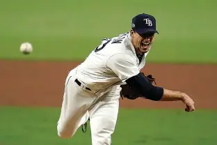  ?? AP Photo/Gregory Bull ?? ■ Tampa Bay Rays starting pitcher Charlie Morton throws against the Houston Astros during the sixth inning in Game 7 of a baseball American League Championsh­ip Series on Oct. 17 in San Diego.