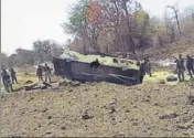  ?? PTI ?? ■ Security personnel inspect the site of an IED blast in the Kistaram area of Chhattisga­rh’s Sukma district on Tuesday.