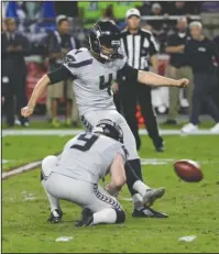  ?? The Associated Press ?? WIDE LEFT: Sunday night’s Seattle-Arizona game ends in a 6-6 tie after Seattle kicker Stephan Hauschka (4) misses a field-goal attempt in the last minute of overtime. The game was 3-3 after regulation and marked the NFL’s first tie in two years.