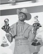 ?? MYUNG J. CHUN/LOS ANGELES TIMES ?? Lil Nas X, seen at the 2020 Grammy Awards in Los Angeles, has finally released his long-awaited full-length debut album.