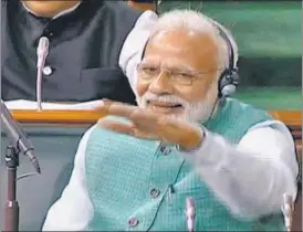  ?? ANI ?? ■ Prime Minister Narendra Modi cheers as finance minister Piyush Goyal presents the interim budget in Parliament on Friday.