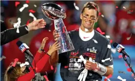  ??  ?? Tom Brady, who won six Super Bowls in 20 seasons with the New England Patriots, left the franchise before signing a two-year, $50m contract with the Bucs last year. Photograph: Mark J Rebilas/USA Today Sports