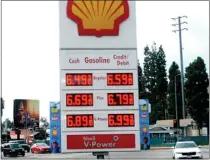  ?? PHOTO BY MIKE MEADOWS ?? The cash price for a gallon of regular is $6.49at the Shell gas station at Ventura Boulevard and Vineland Avenue in Studio City on Saturday, as oil prices continue to climb.