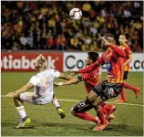  ?? CONTRIBUTE­D BY ERIC ROSSITCH ?? Atlanta United striker Josef Martinez (left, battling Herediano during the opener last week) admits, “Of course we had problems,” but adds: “We aren’t worried about that after one game.”