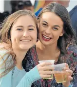  ?? Picture: MO MAHASHE Picture: IVOR MARKMAN ?? THREE CHEERS: Jolanie Last, left, and Deniel Terblanche enjoy a glass of beer at the Alliance Française Street Music Festival in Richmond Hill last weekend