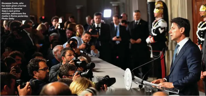  ??  ?? Giuseppe Conte, who has been given a formal mandate to become Italy’s next prime minister, addresses the media in Rome yesterday. Photo: Getty