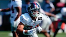  ?? PAUL SANCYA/AP ?? Giants safety Dane Belton hopes to rebound from an injury-plagued 2022 season. Defensive coordinato­r Wink Martindale said, “He’s one of those guys that the ball finds him, and he finds the ball.”