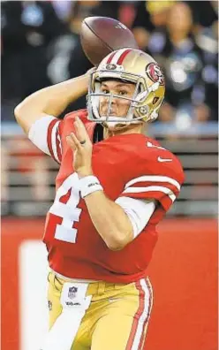  ?? GETTY ?? Nick Mullens looks to pass in stellar debut against Raiders.