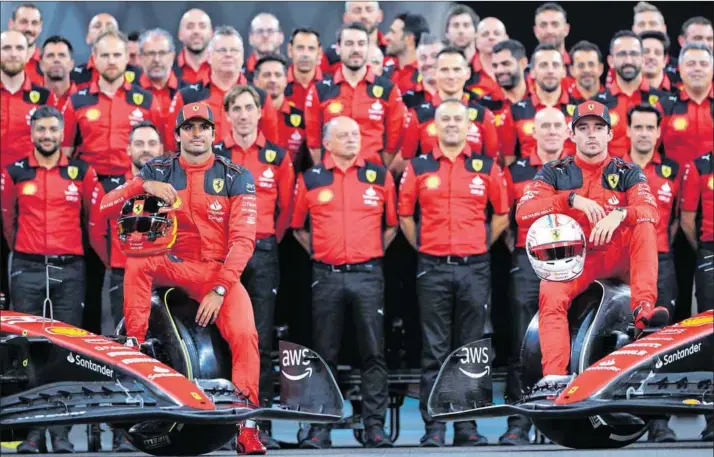  ?? Photo: Clive Rose/getty Images ?? New teammate: Charles Leclerc and Carlos Sainz pose for the Ferrari team photo at the Abu Dhabi Grand Prix, in the United Arab Emirates, in November.