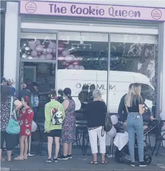  ?? ?? A queue at The Cookie Queen on Cosham High Street on Saturday Picture: Gemma Daysh.