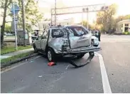  ?? GEORGE SKENE/STAFF FILE, LEFT; CHRISTAL HAYES/STAFF FILE, ABOVE ?? Vehicles fared poorly in SunRail crashes in March in Maitland, above, and Orlando in June 2014, left.