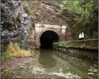  ??  ?? The tunnel complex beneath Burns Park is expected to be closed until Labor Day so the city can dredge out sluggish Harper Creek.