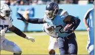  ?? John Amis / Associated Press ?? Titans running back Derrick Henry plays against the Colts on Monday.