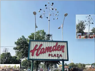  ?? Meghan Friedmann / Hearst Connecticu­t Media Meghan Friedmann / Hearst CT Media ?? Hamden Plaza on Dixwell Avenue in Hamden on Thursday.
Top right, the sculpture “Windamajig” by artist George Rhoads next to a Tesla charging station in Hamden Plaza in Hamden on Thursday