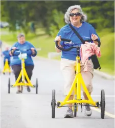  ?? ASHLEY FRaSER ?? New this year to the Ottawa Hospital’s The Ride, which was held Sunday, was a team using the Alinker walk-assist bikes. The Ride is Eastern Ontario’s most successful single-day cycling fundraiser.