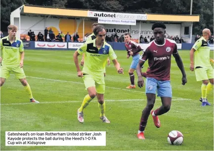  ??  ?? Gateshead’s on-loan Rotherham United striker Josh Kayode protects the ball during the Heed’s 1-0 FA Cup win at Kidsgrove