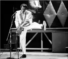  ?? AP PHOTO ?? Chuck Berry performs during a concert celebratio­n for his 60th birthday Oct. 17, 1986, at the Fox Theatre in St. Louis, Mo.