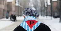  ?? PHOTO: REUTERS ?? A survivor is seen at Auschwitz as he attends ceremonies marking the liberation of the camp and Internatio­nal Holocaust Victims Remembranc­e Day yesterday.