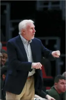  ?? THE ASSOCIATED PRESS FILE ?? It might have been an old act, and maybe it wasn’t ... but San Antonio Spurs white-haired head coach Gregg Popovich apparently wasn’t able to name a starting Spurs player or three Wednesday night at Wells Fargo Center.