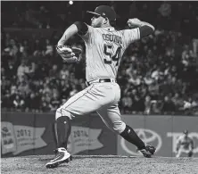  ?? Thearon W. Henderson / Getty Images ?? Roberto Osuna made his Astros debut with a five-pitch eighth inning Monday night.